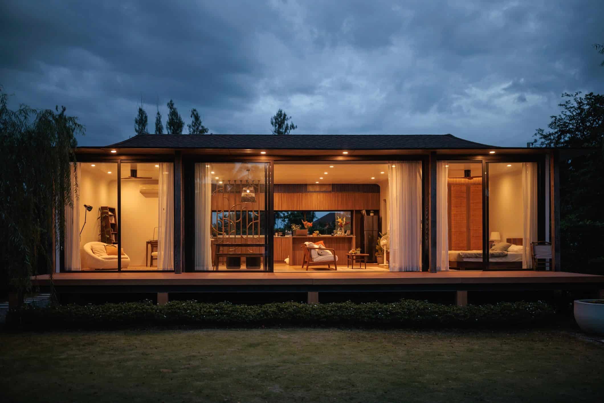 Modern residential home exterior at dusk